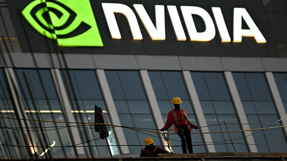 2f5eef-20260224-a-worker-stands-on-a-construction-site-in-front-of-the-nvidia-logo-1000