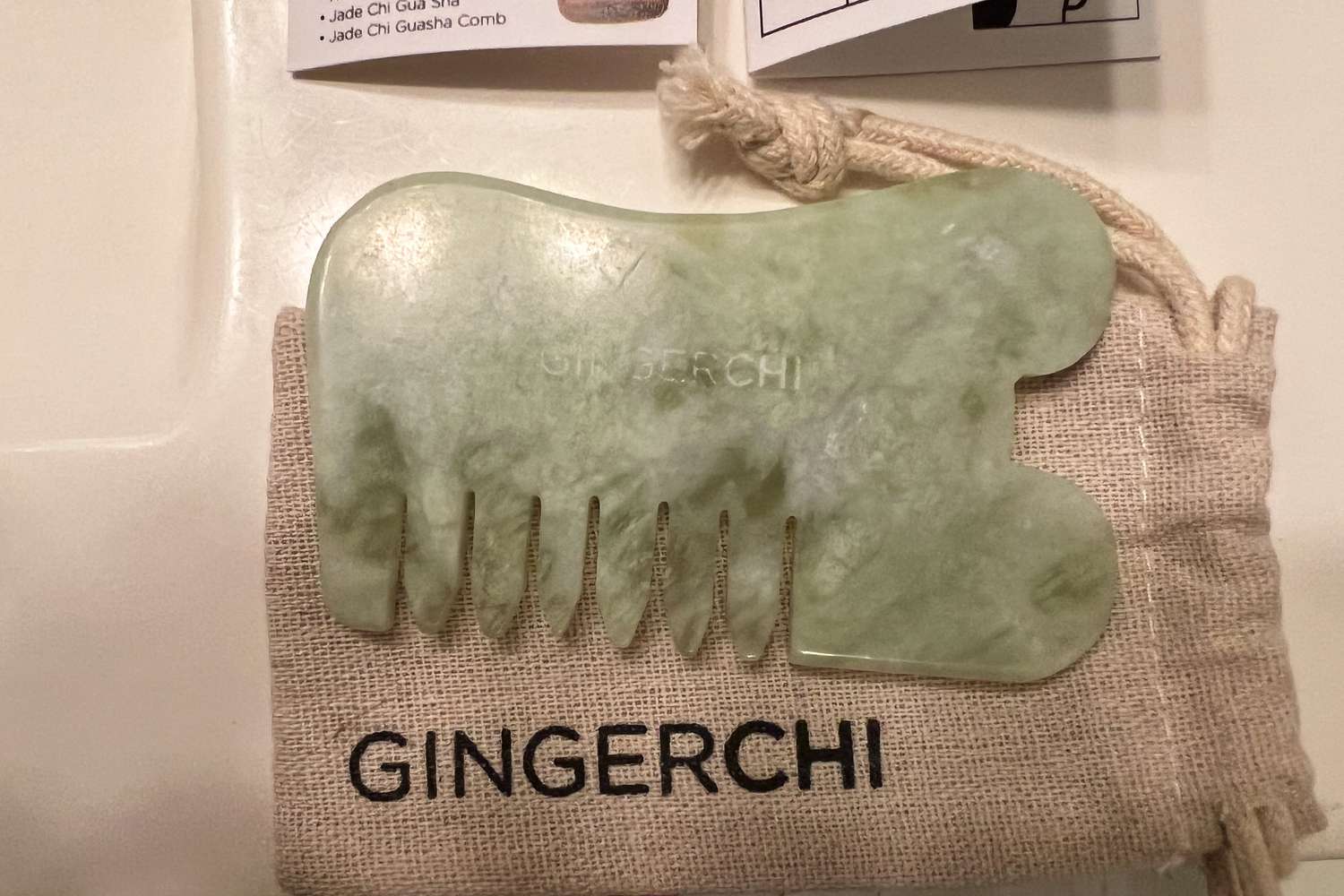 peo-facial-tools-gua-sha-ice-rollers-test-ginger-chi-jade-face-comb-emily-woodruff-3crop-9e39daffb52646699cd072d34cc58e93