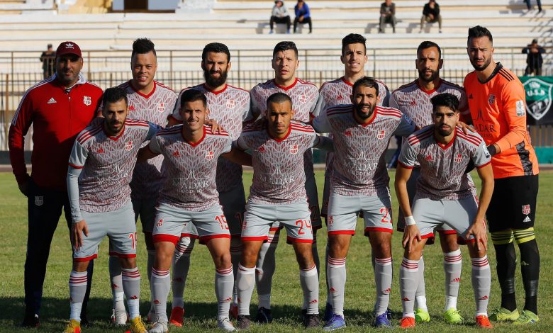 A crowded stadium during an Algerian Ligue Professionnelle 1 match.