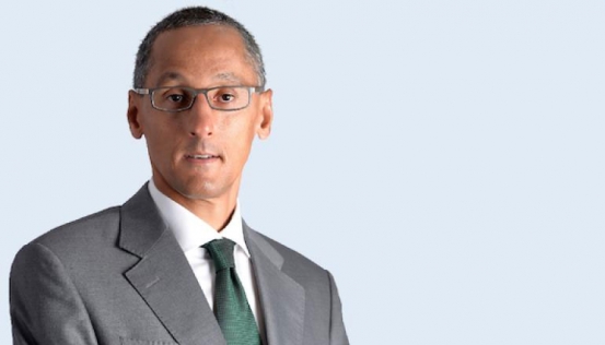 Portrait of Philip Ndegwa, a prominent Kenyan businessman and economist